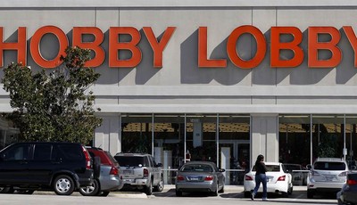 
              Customers walk to a Hobby Lobby store in Dallas on Thursday, Nov. 1, 2012. The arts and craft supply company owned by a Christian family asked a judge Thursday, Nov. 1, 2012 to block a 
